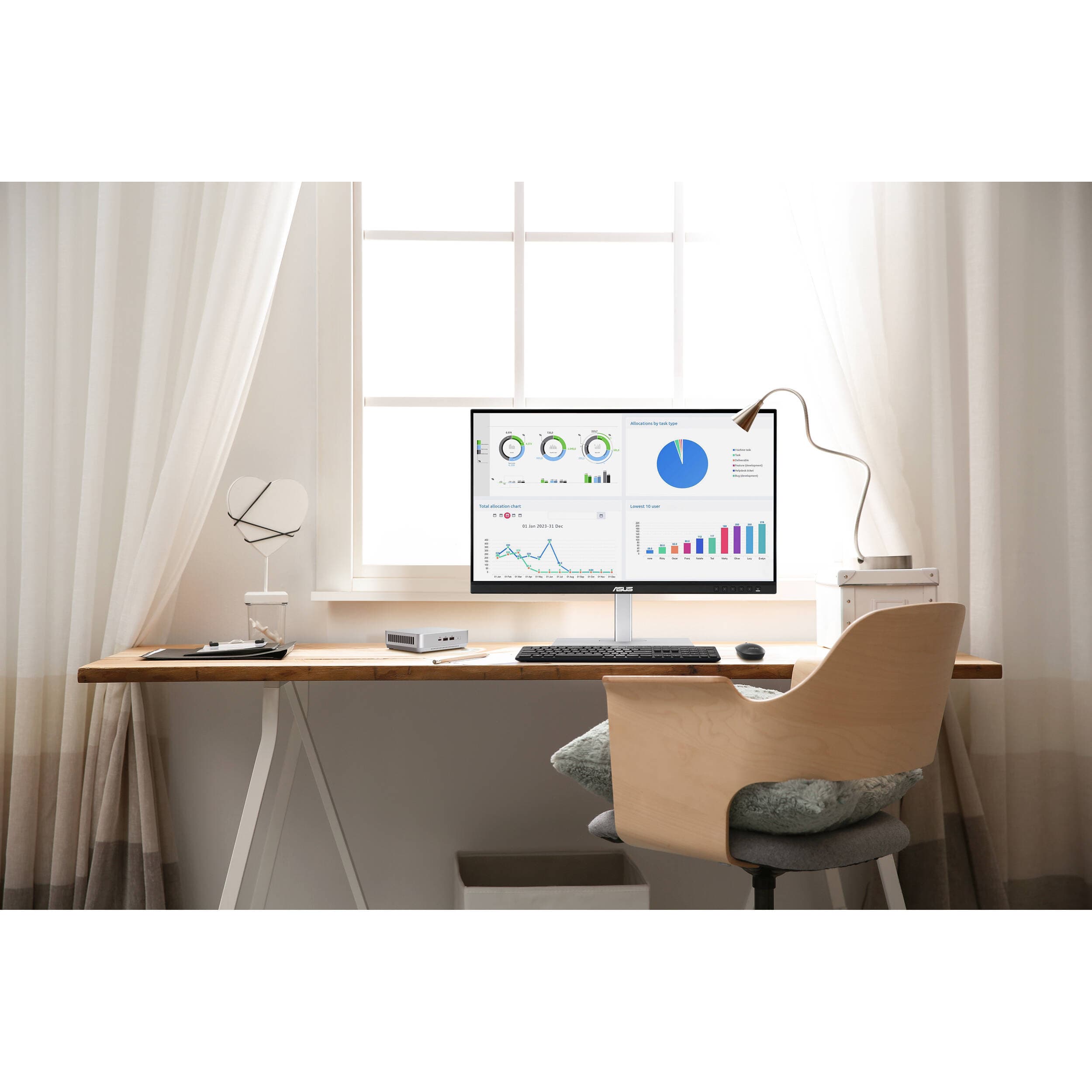 ASUS NUC 14 Pro+ RNUC14RVSU5068AUI mini PC with Intel Core Ultra 5, silver aluminum chassis, and VESA mount